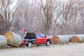 59862-newproducts-DewEze-876-Pulling-Out-Bales-from-a-row.jpg