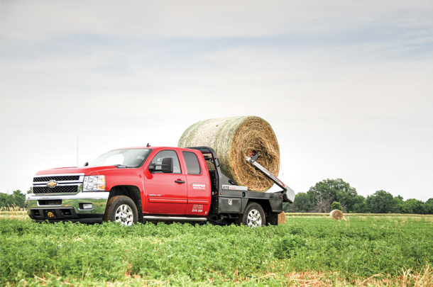 Pivot squeeze bale beds open up to about 110 inches wide and close down to 34 inches.